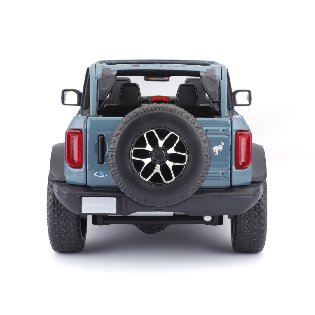 31457 BU Bburago Maisto - Ford Bronco Badlands 2021 (no door), blu